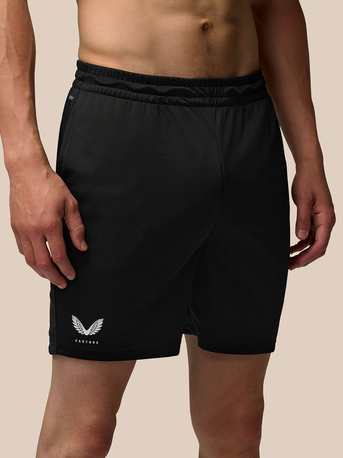 Back view of black Adapt Training Shorts showing elastic waistband and right rear Aertek branding