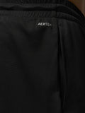 Close up of black Adapt Training Shorts waistband showing AERTEK branding.