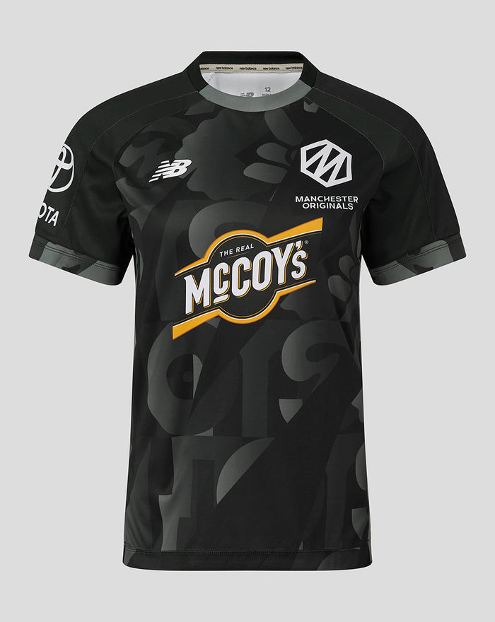 Front view of Manchester Originals women's replica playing shirt with camouflage pattern and McCoy's sponsor logo.