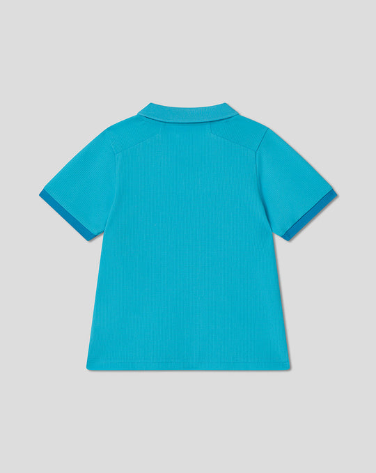 Back view of bright blue infant ODI short sleeve polo shirt