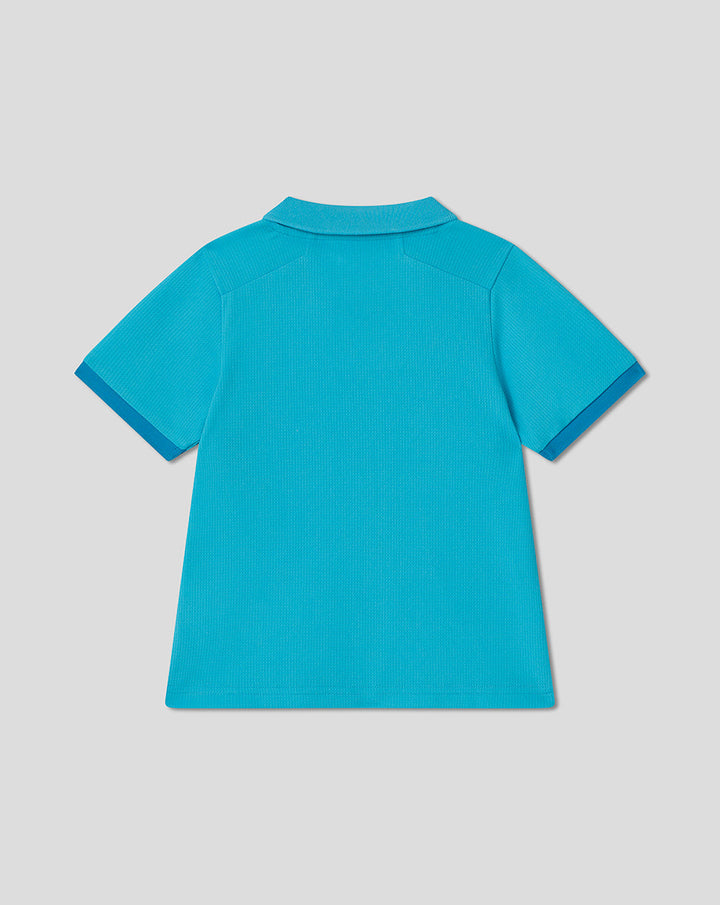 Back view of bright blue infant ODI short sleeve polo shirt