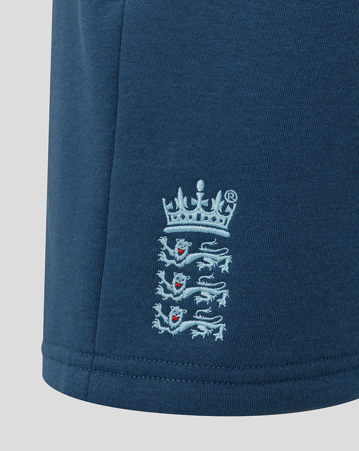 Junior Adapt fleece shorts in Ensign Blue with navy three lions crest on the leg