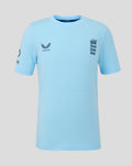Front view of a light blue Junior Travel T shirt with Navy Three Lions crest on the chest and Castore branding.