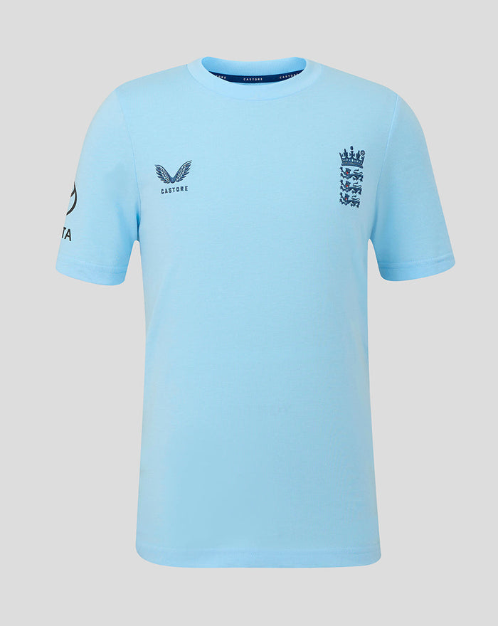 Front view of a light blue Junior Travel T shirt with Navy Three Lions crest on the chest and Castore branding.