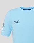 Close-up of light blue tee showing a small navy crest on the chest with Castore branding along the neckline