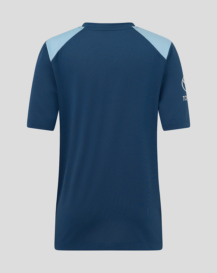 Back view of junior blue training T shirt with light blue shoulder panels