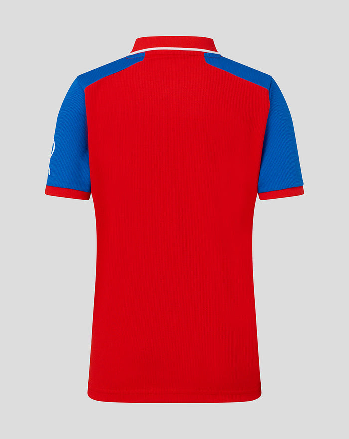 Back view of red junior T20 WWC shirt with blue sleeves and white collar trim