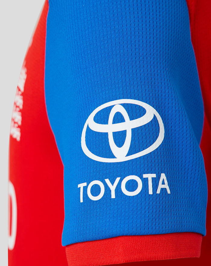 Toyota logo on the blue sleeve of the red junior T20 WWC shirt