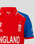 Close up of junior red England T20 shirt showing Three Lions crest on the chest and ENGLAND lettering