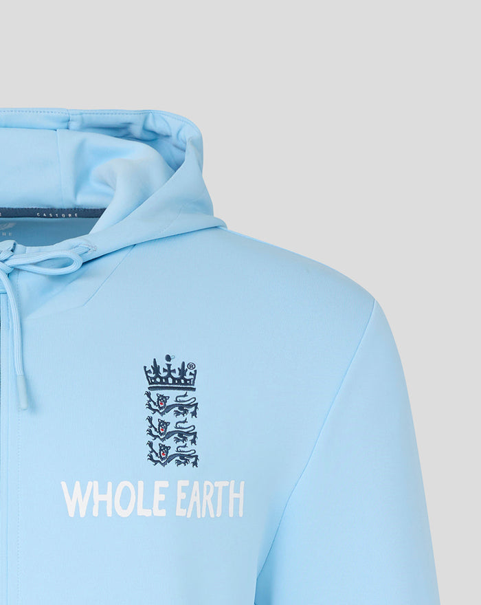 Close up of light blue Travel Flex hoodie front showing England crest above the Whole Earth branding
