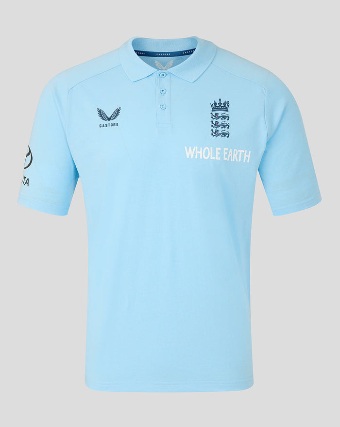 Front view of light blue travel polo with navy Three Lions crest on the chest