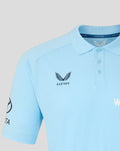 Light blue Travel Polo close up showing collar and Castore crest on the chest.