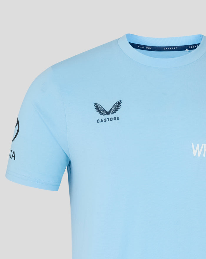 Back view of light blue Travel T-Shirt showing navy CASTORE neck tape