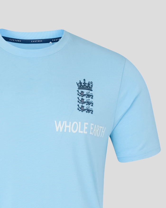 Light blue Travel T-Shirt close up of navy three lions crest on chest and CASTORE neck label
