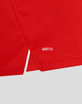 Close up of red T20 Pro long sleeve shirt fabric with AERTEK logo near the hem