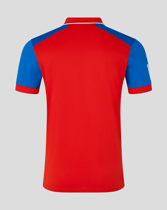 Back view of the red T20 Pro short sleeve cricket shirt with blue side panels.