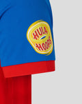 Close-up of blue sleeve with Hula Hoops badge on a red T20 shirt