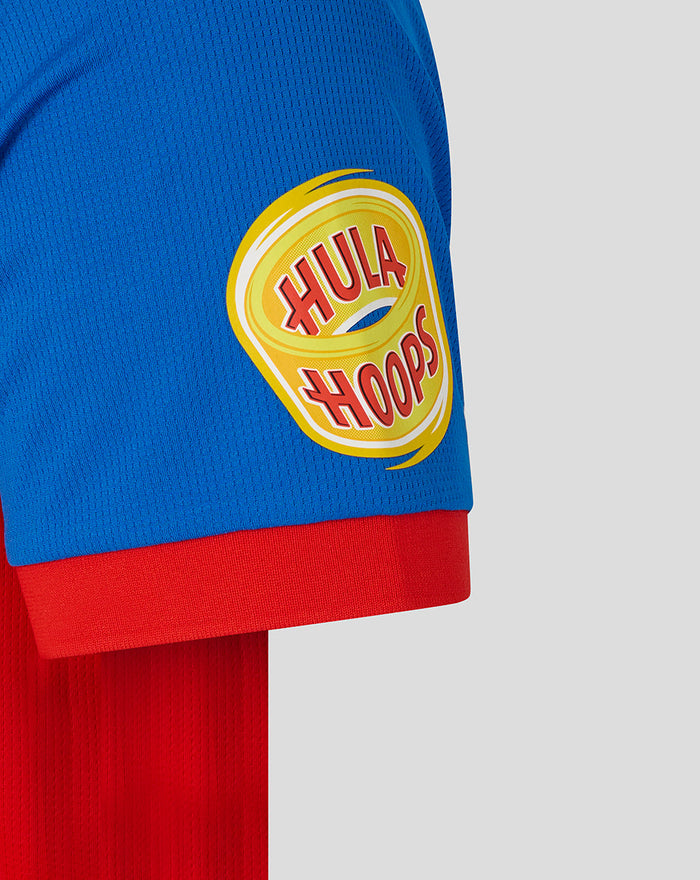 Close-up of blue sleeve with Hula Hoops badge on a red T20 shirt