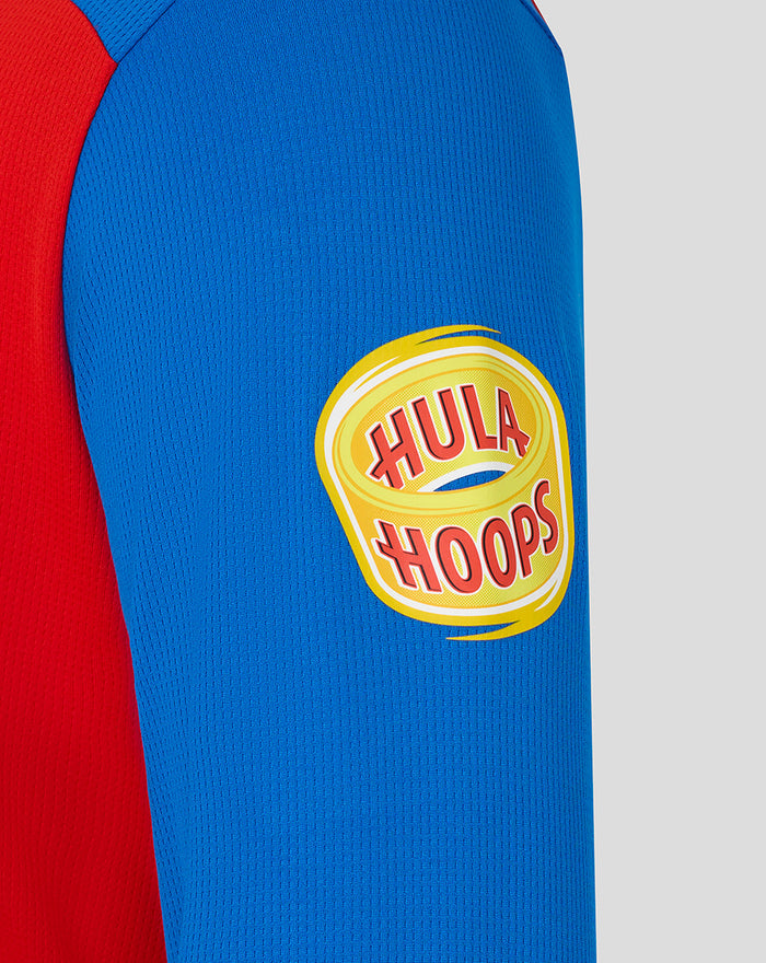 Blue sleeve features a yellow circular Hula Hoops patch on the red and blue T20 shirt