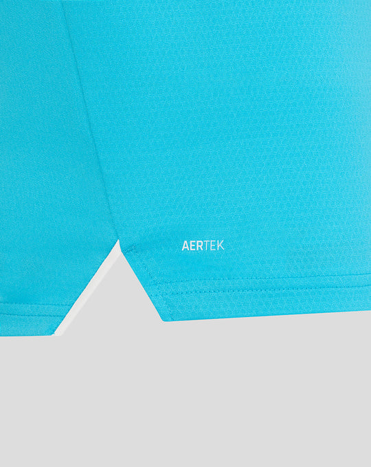Close-up of blue ODI Pro short sleeve shirt hem with AERTEK branding.