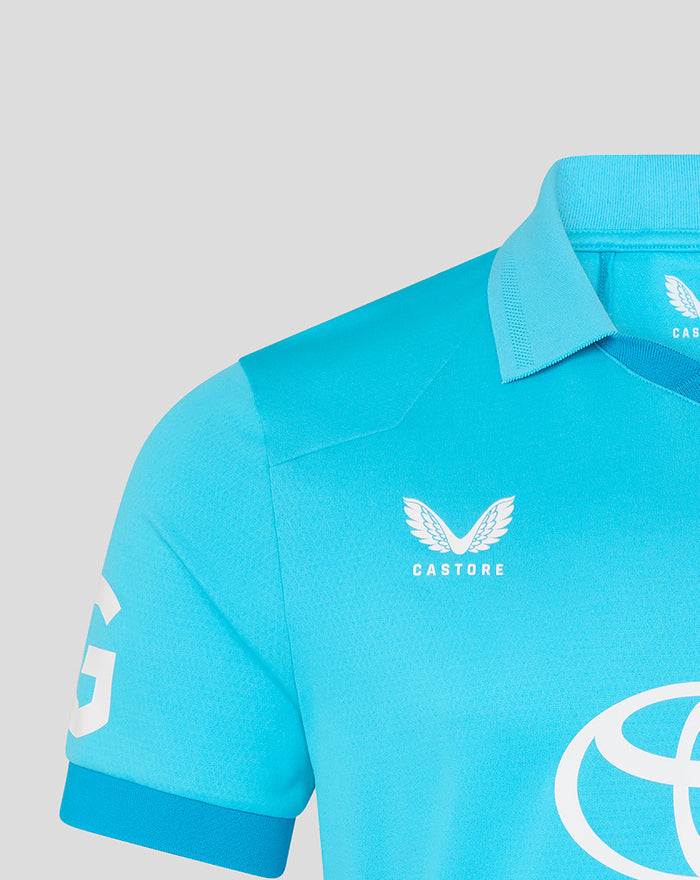 Bright blue ODI Pro short sleeve cricket shirt close-up showing Castore logo and Toyota sponsor.