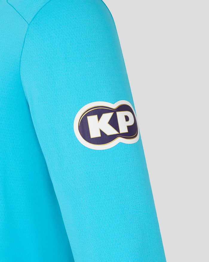 Bright blue ODI Pro long sleeve shirt sleeve featuring a KP patch