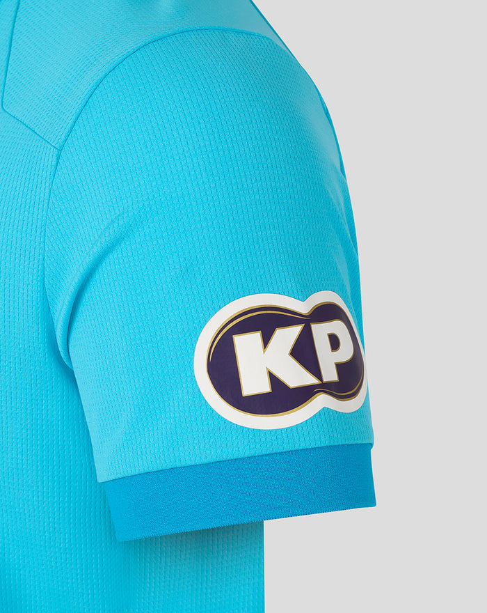 Blue jersey sleeve featuring a KP patch near the cuff