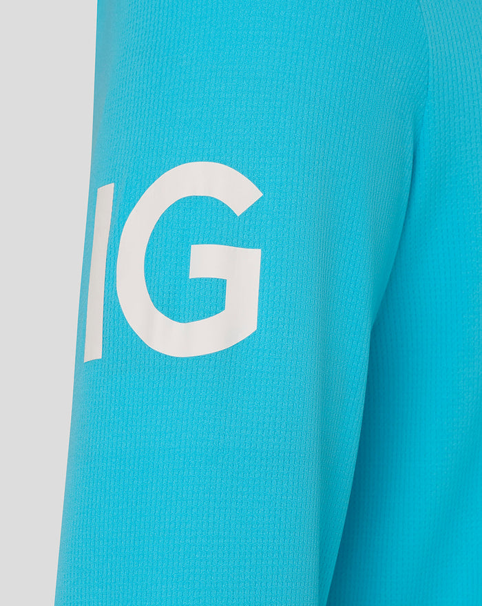 Close up of blue sleeve showing bold white graphic on the ODI shirt