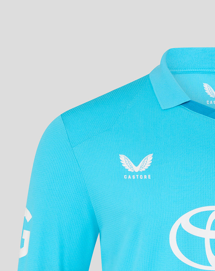 Close up of blue ODI shirt chest showing the Three Lions crest and CASTORE branding near the collar.