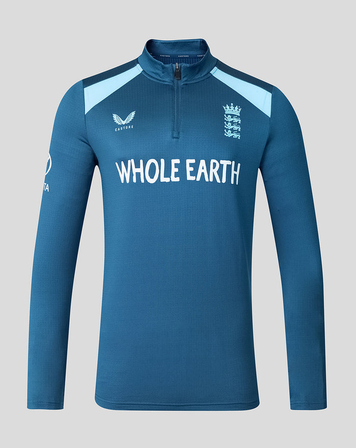 Front view of blue training midlayer top with zip collar and light blue shoulder panels displaying Whole Earth sponsor and Three Lions crest