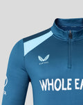 Front view of blue training top featuring bold white text across the chest and Castore branding.