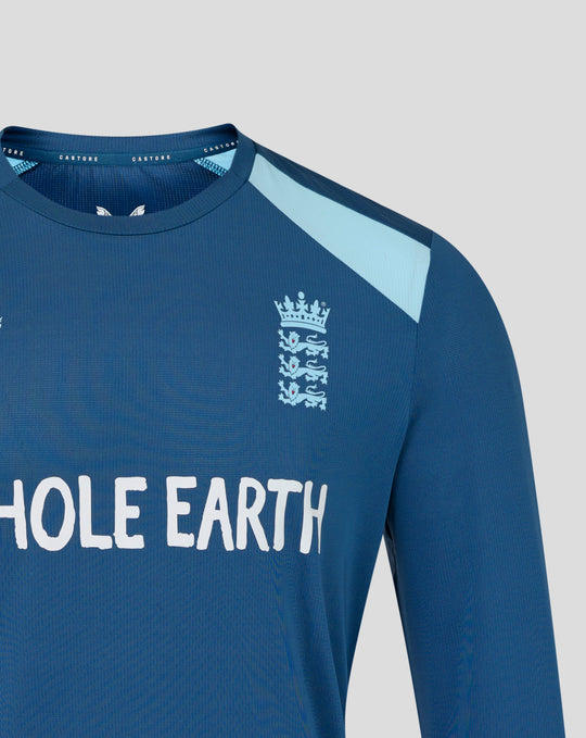 Close-up of blue training long sleeve shirt showing light blue shoulder panel and embroidered Three Lions crest on chest