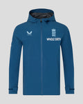 Front view of men's ensign blue Training Rain Jacket with white crest and Whole Earth logo on the chest