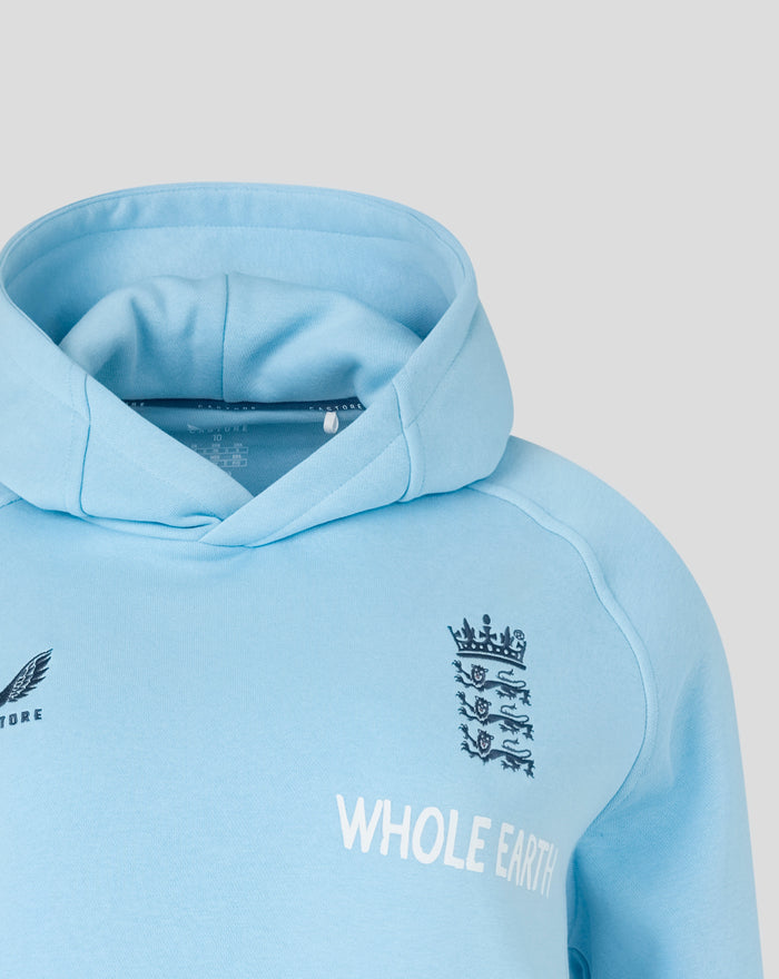 Close up of an airy blue travel fleece hoodie hood with the Three Lions crest on the chest.