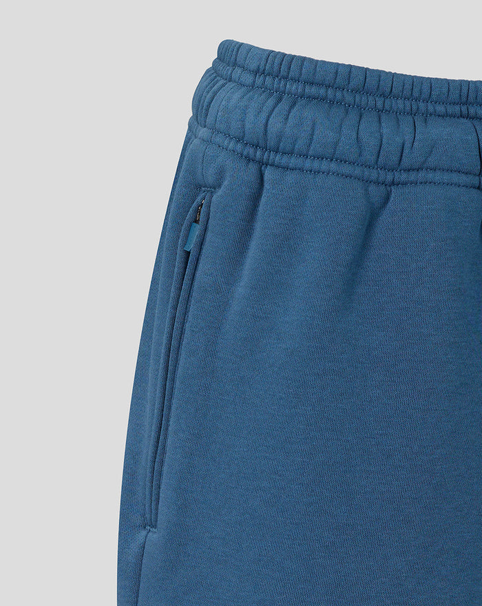 Close up of waistband and side zip pocket on women's ensign blue travel fleece shorts