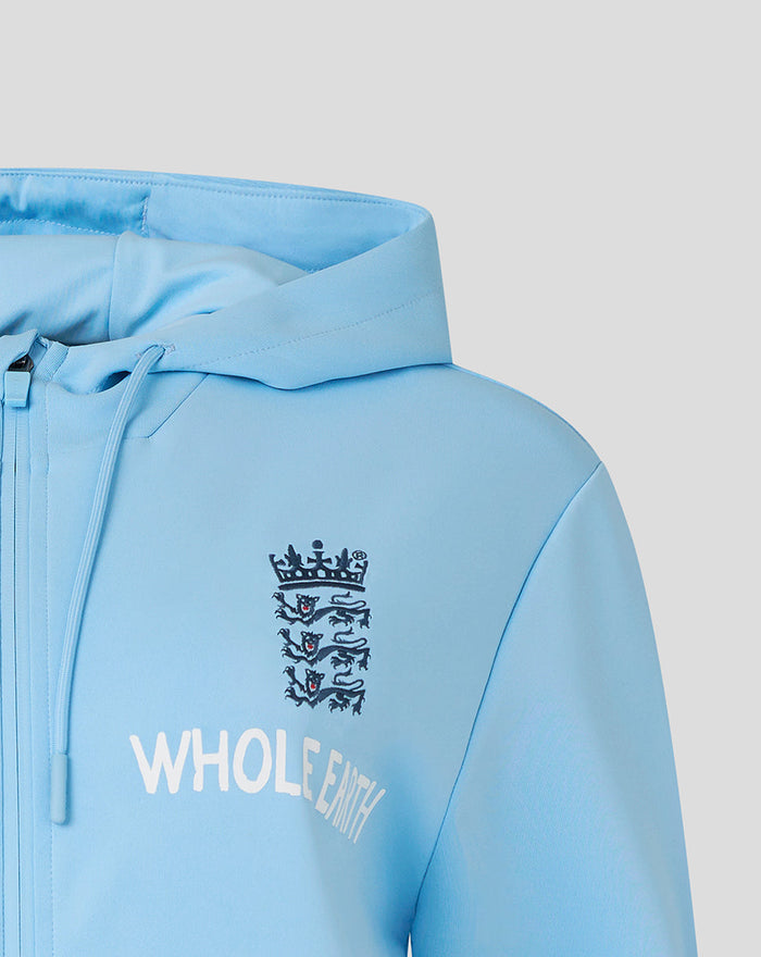 Close up of light blue hoodie chest with England crest and Whole Earth text