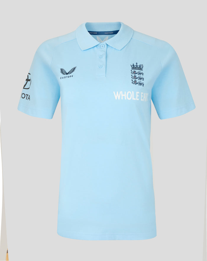 Front of airy blue Travel Polo with navy England crest on right chest and Castore logo on left chest