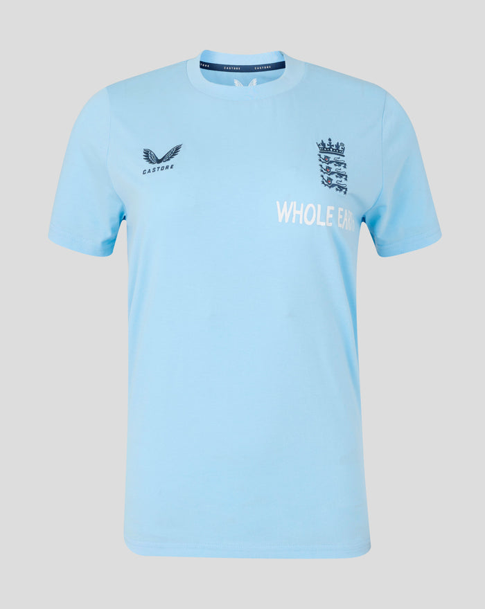 Light blue travel T shirt with navy crest on the chest and Whole Earth text on the front
