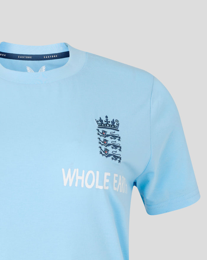 Close-up of airy blue Travel T shirt showing inner Castore label and small navy Three Lions crest on chest