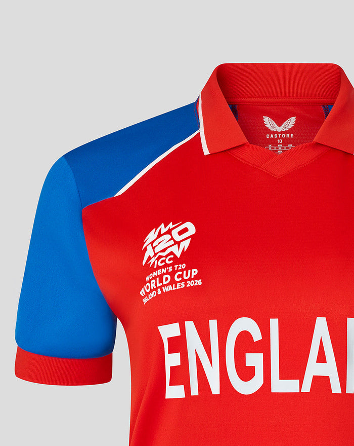 England women's T20 World Cup shirt in red with blue sleeves and large ENGLAND lettering.