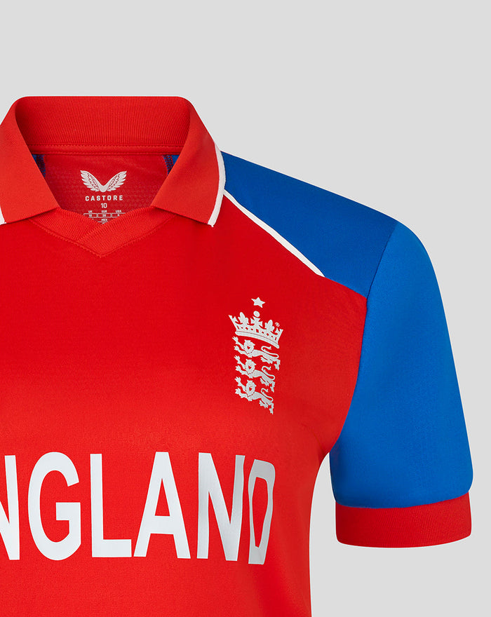 Front view of red England T20 World Cup shirt with blue sleeves and white ENGLAND lettering.