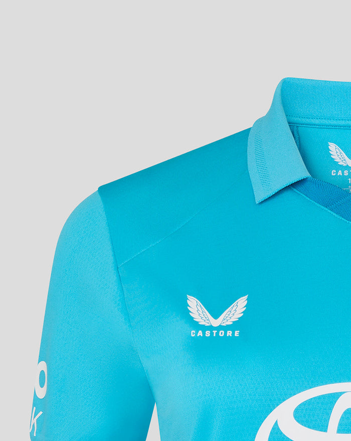 Close up of blue ODI Pro shirt collar and shoulder with branding and crest detail