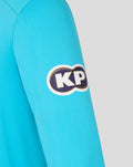 Close up of a vibrant blue ODI Pro long sleeve shirt sleeve with a KP patch.