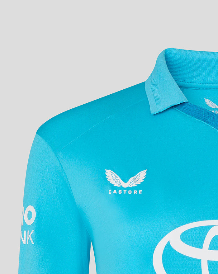 Close up of blue ODI Pro shirt collar and chest showing the Castore logo.