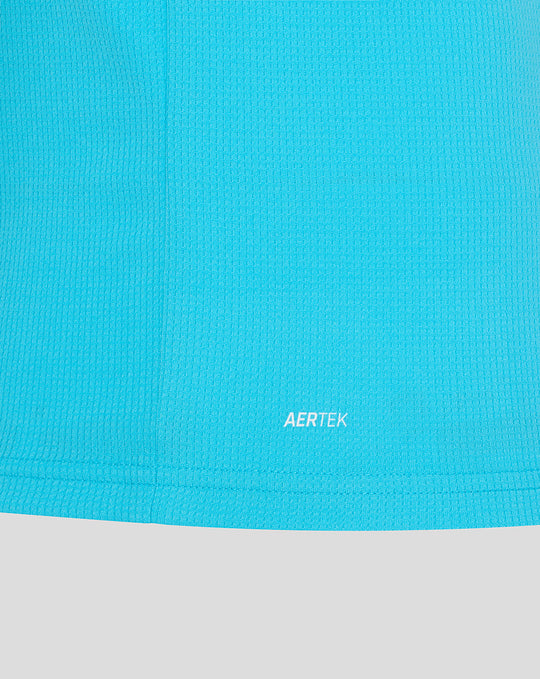 Close-up of blue textured fabric with AERTEK branding