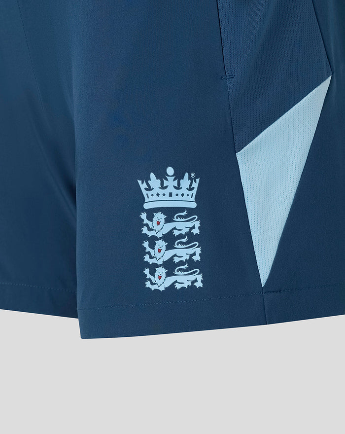Back view of blue training shorts with an elastic waistband and light blue side panel