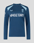 Blue long sleeve cricket training top with light blue shoulder panels, Three Lions crest and Whole Earth sponsor.