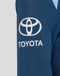 Close-up of blue training long sleeve showing Toyota sponsor logo on the sleeve