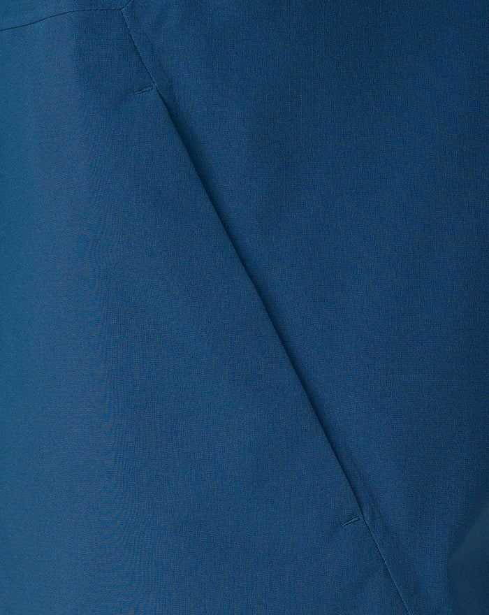 Close-up of blue fabric with seam on the Training Rain Jacket