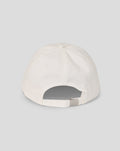 Close-up of a white six-panel Retro Cap crown with a centered button.